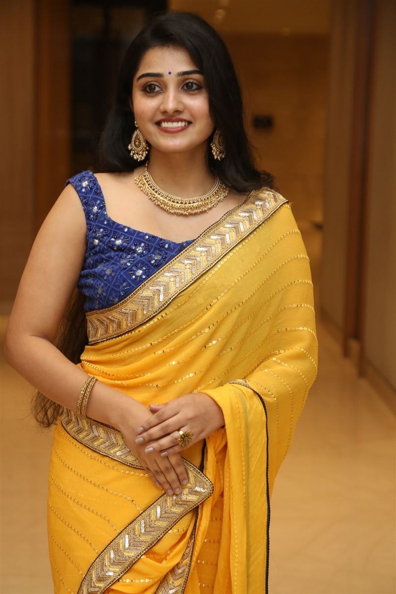 Telugu Actress Athira Raj Stills in yellow Saree